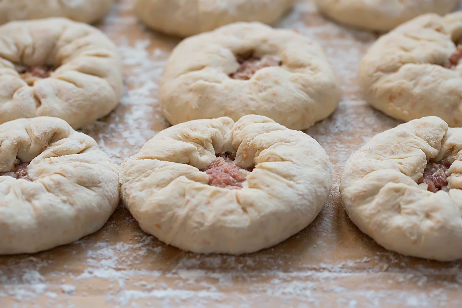 Беляши и колбаса в тесте