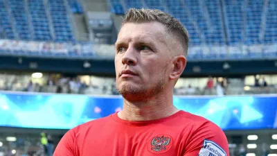 Денис Колодин