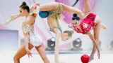 Красавицы-гимнастки показывали сердечки, фанаты отвечали взаимностью. Главные фото мощного турнира в Минске