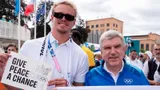 Глава МОК Бах сфотографировался с российским пловцом Сомовым перед стартом Олимпиады
