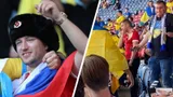 Болельщику с российским флагом разорвали майку на трибуне с украинскими фанатами на матче Евро-2020: фото